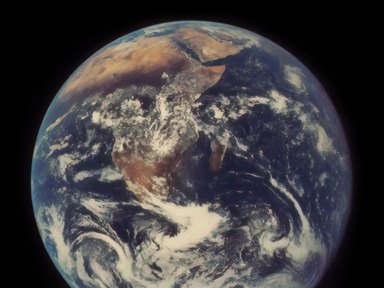 The Earth as seen from space on a black background.